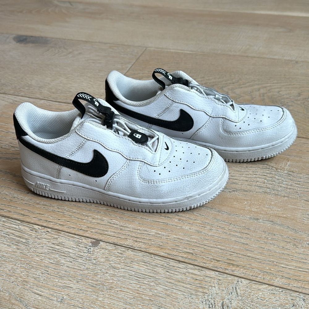 RARE NIKE AIRFORCE locking black swoosh, size 3, no rips, holes tears